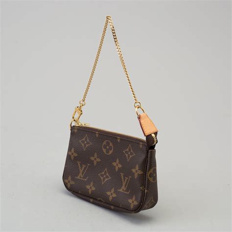 small louis vuitton bag.